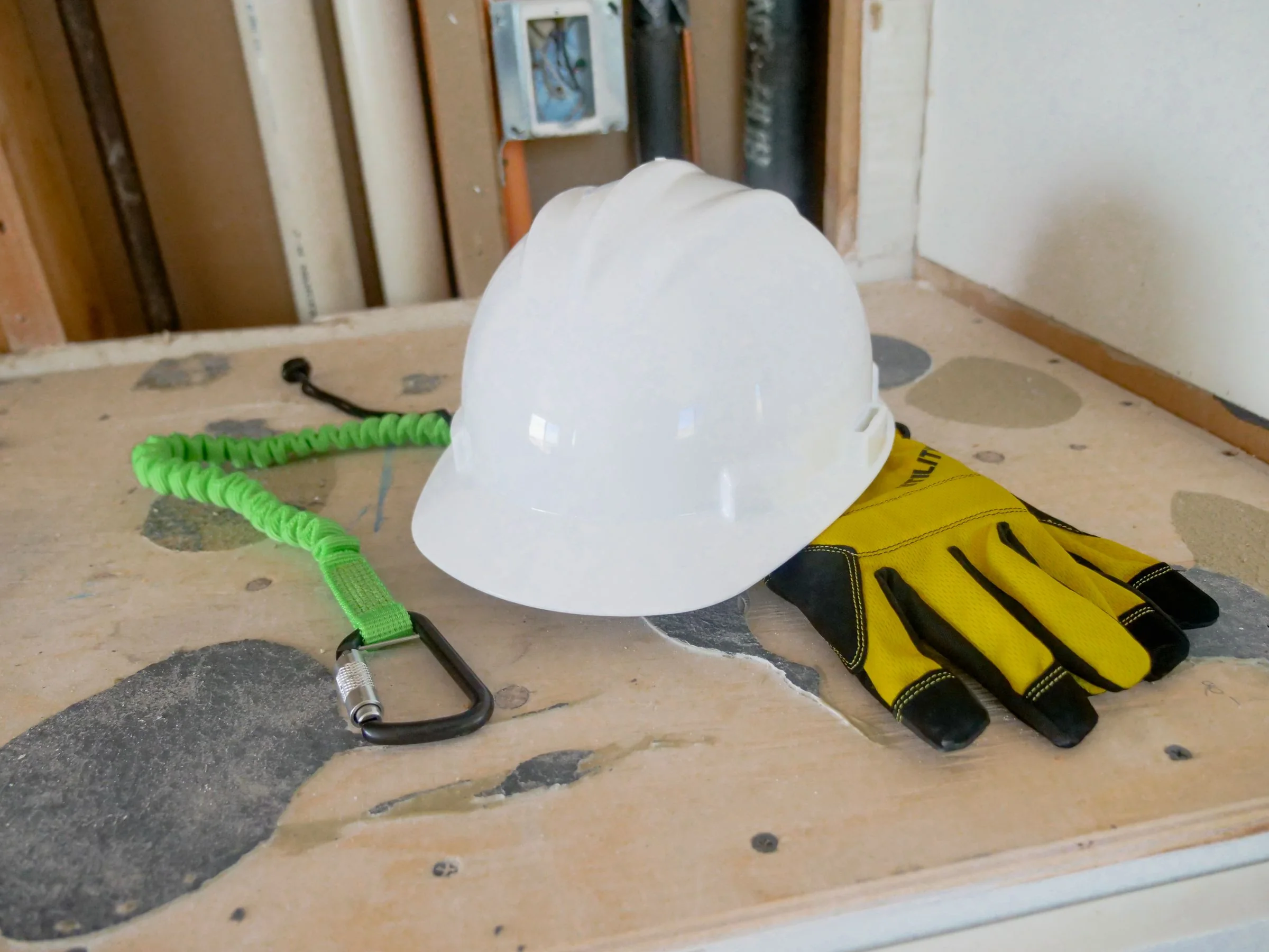 Hard hat, protective gloves and fall-protection equipment